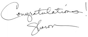 A close up of two handwritten signatures